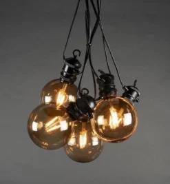 Juhlavalosarja aurinkokennolla Konstsmide Amber, 10-osainen, latausmahdollisuus